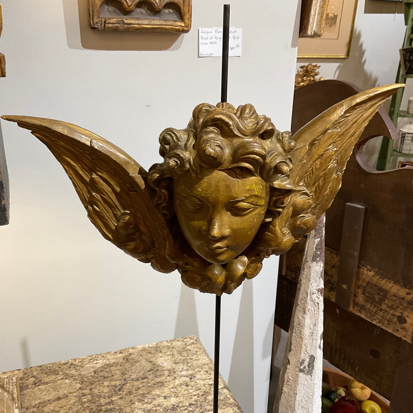 Carved and gilded wood angel